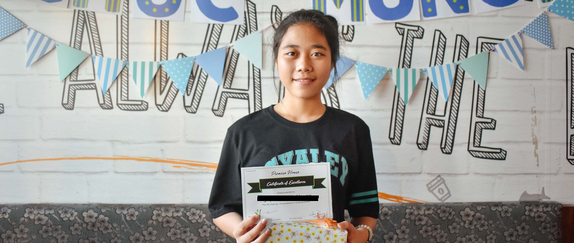 Huyen finds success at Promise House banner